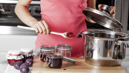 Woman cooking a jam